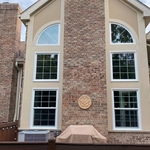 Double hang windows with half arch