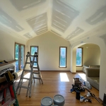 Prepping roof, caulking, covering holes.