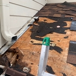 Old shingles removed and Rotten OSB spotted
