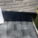 Chimney protection! Wrapped with black coil for appearance look and sealed with ice n water plus triple bond roofing sealer.