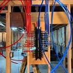 Partway through building the homes hot and cold manifold.