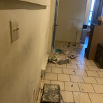Repaired then coated the wall with kilz to remove stains