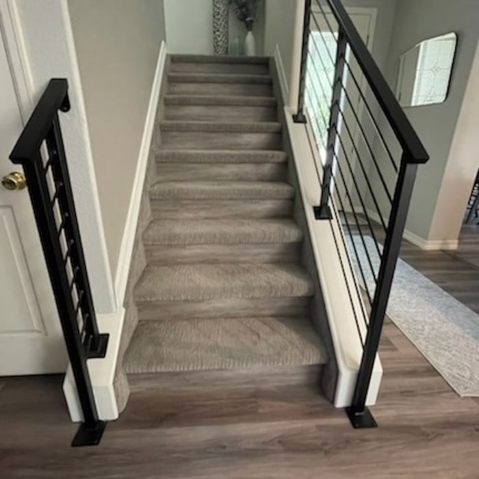 Laminate Flooring and Carpet on Stairs.
