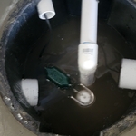 A look inside the crock. 4 inch perforated hdpe pipe with 1/2hp Zoeller sump pump.