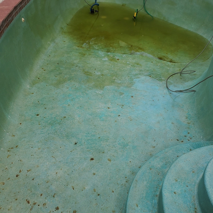 Pressure washing and finishing up with the acid wash.