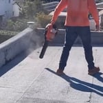 Once everything is wire brushed we proceed to blow off the entire roof.