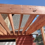 Ledger 2x10 to existing Barn for deck.