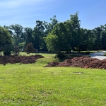 22 tri axle dump truck loads of red clay to be filled in and smoothed out.