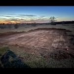 40ft by 60ft pad graded level and ready for concrete.