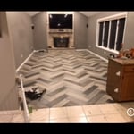 Herringbone pattern tile floor