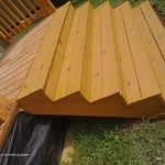 Sanded the steps down to bare wood and I filled all holes and cracks up with putty. I then stained the steps to a yellow pine look. That's what the customer wanted. They were very happy with the outcome.