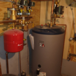 Tankless water heater storage tank. Hot water heat system