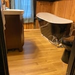 Sub floor leveled and replaced, holes repaired, vinyl flooring and baseboard molding added, new appliances hooked up to a more affective style of plumbing.