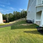 Fence/drains/mulch/rock