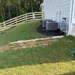 Fence/drains/mulch/rock