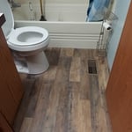 new toilet installed, floor completed
