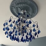 New chandelier installation with plaster repair and paint.