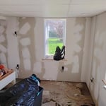 During heavy rainfall, water leaked into the basement through the walls.