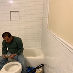 Done with the tile and vanity now installing a toilet to complete the bathroom