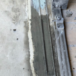 Sliding door track or railing been repaired by water and rust