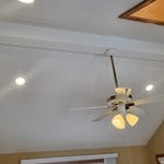 The dark Family room is now well-lit, the addition of four recessed lights and a light package for the existing fan worked wonders!!!