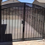 Double Gates with automatic locking box and key entrance.