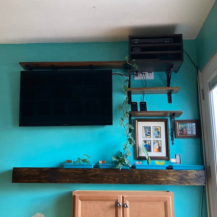 Entertainment center shelves with charging station