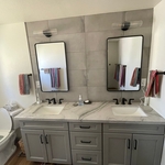 Master Bathroom with new counter, vanity, tile and mirrors