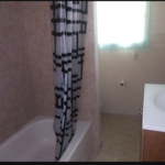 Bathroom gutted and remodeled - new plumbing, ceramic installed, etc.