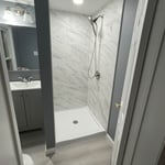 Upgraded shower with brand new tile after