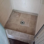 Hand framed and tiled shower pan.