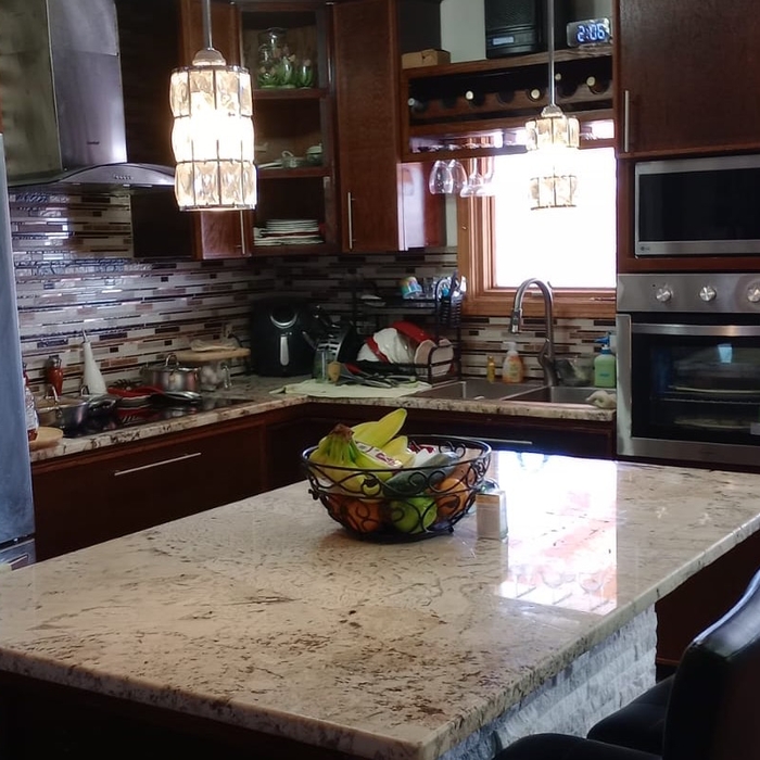After- The island is done and the cabinets are completed.