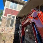 Tight quarters excavating next to garage