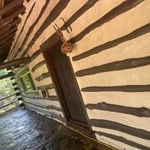 Exterior Painting Project, gutter cleanup, chinking between logs, pressure washing of home and roof,