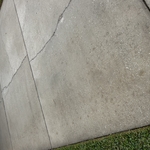 Pressure washing driveway sidewalk