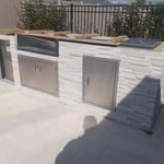 custom California kitchen after adding stone veneer