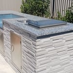 stone countertop added with wine cooler installed