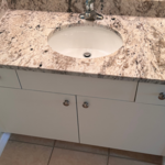 The sink and vanity installation.