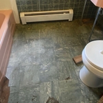 The demo on this job was quite interesting! We found layers of previous flooring and had to practically reconstruct the floors before we were able to lay down the tile. However, we’re always prepared for the little surprises!