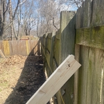 Fixing the leaning posts prior to demoing the old pickets and cross members.