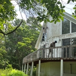Before… home was in need of deck reinforcement and exterior paint