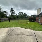 Return to house aluminum section with double drive gate.