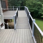 Massive trex deck and vinyl rails arch walkway