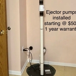 Residential sewage ejector pump installation.