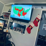 Tv on the living room wall