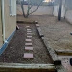 The yard after myself and employees where finished. This was a clean up removing all the weeds. Clearing walk paths . Preparing it for new tenants.