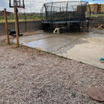 Back yard completed no more weeds trash . Room for her family now.