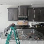 Lining Up the correct spacing in between fixtures; installing ceiling boxes to support the weight; running the wires.