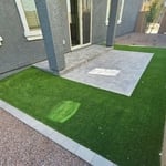 Pavers line with artificial grass