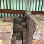 Image 1 shows bricks being properly stored.